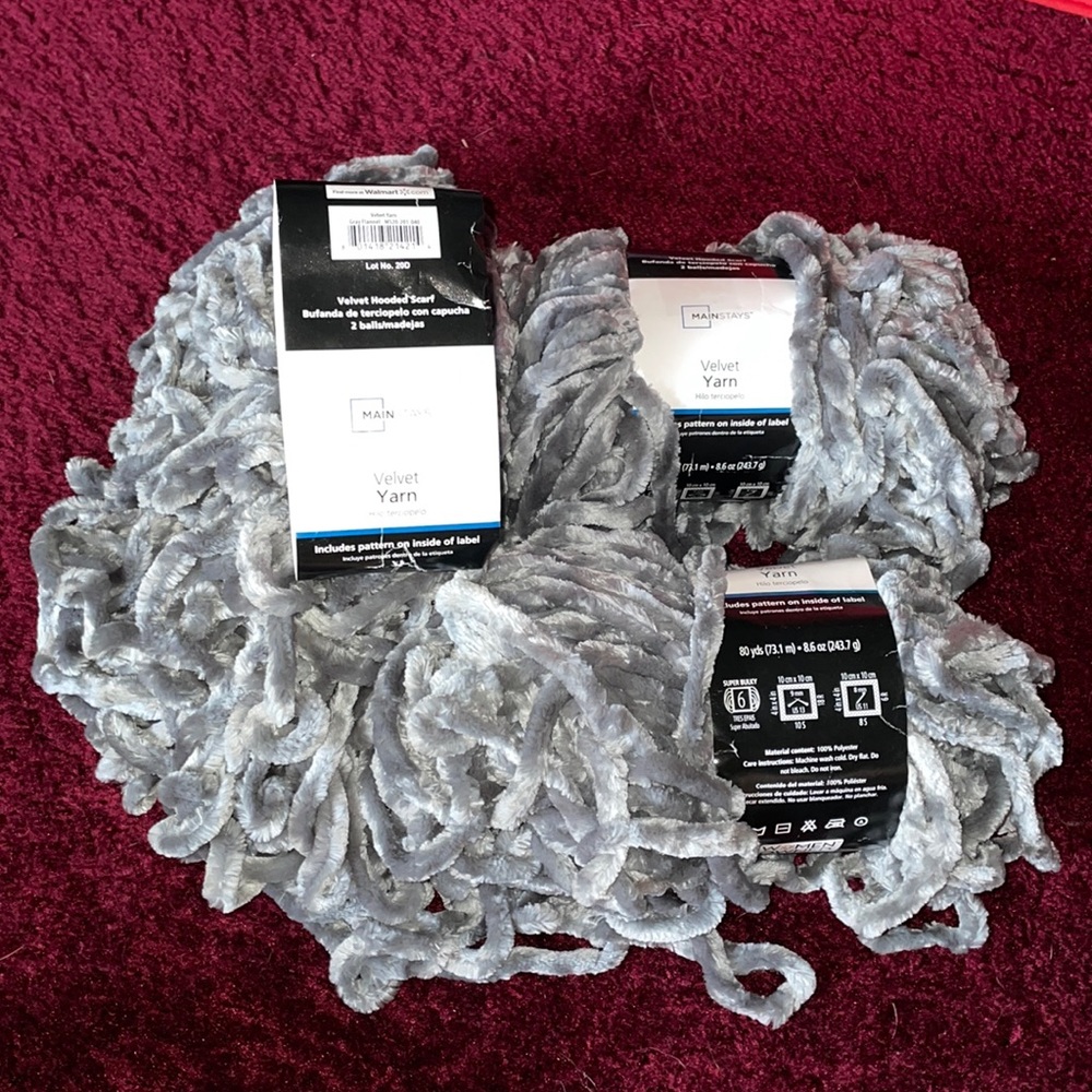 3 balls of velvet gray yarn.